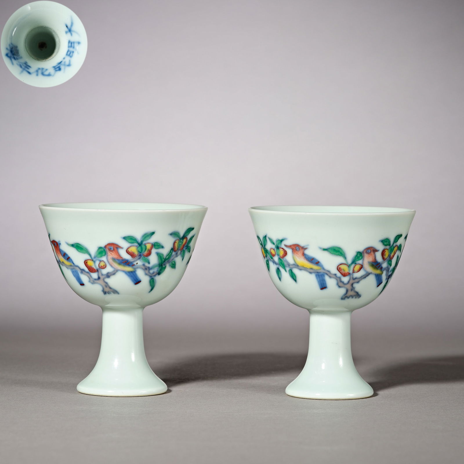 Ming Dynasty of China,A pair of colorful flower and bird patterned high foot cups: H. 7.8 cm. W. 7.1 cm.