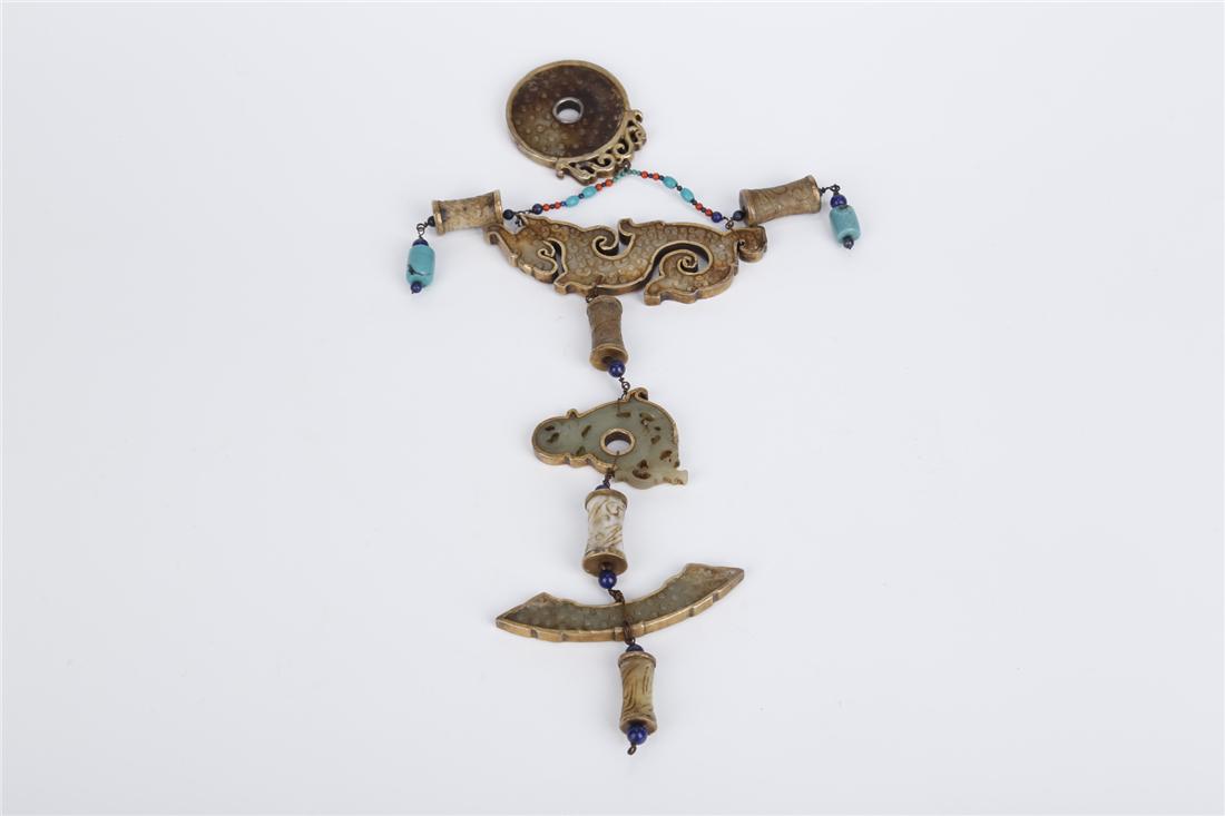 A SET OF ANTIQUE JADE HANGING PENDANTS: A Set of Antique Jade Hanging Pendants, Gold Rim, Yuan Dyn.