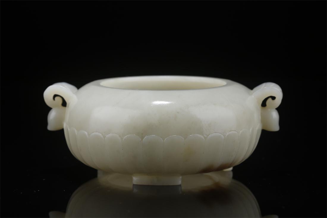 A HETIAN JADE TWO-EAR CENSER. (1 of 9)