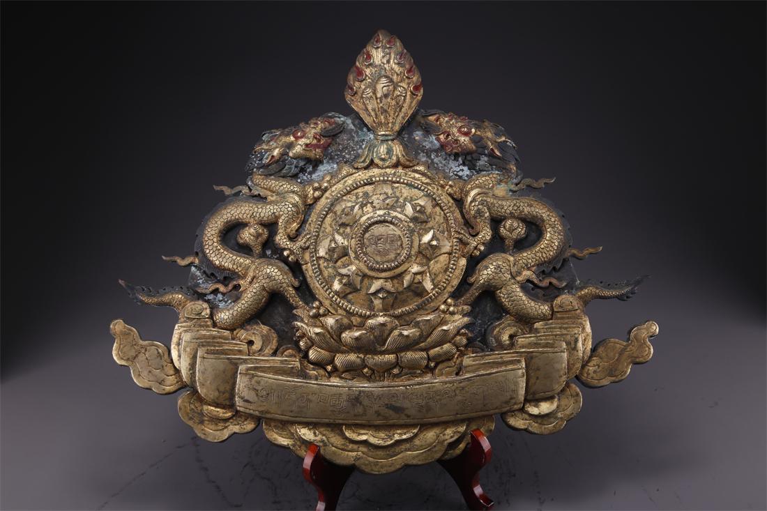 A GILT BRONZE BUDDHA PLATE. (1 of 9)