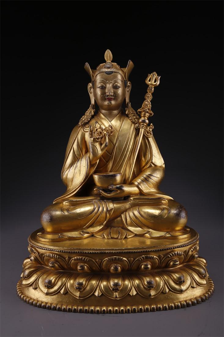 A GILT BRONZE PADMASAMBHAVA BUDDHA STATUE. (1 of 9)