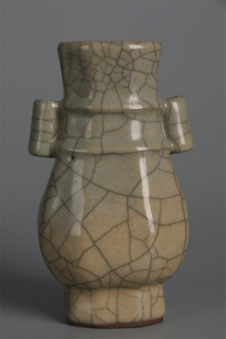 A PORCELAIN BOTTLE WITH PIERCED EARS, GE KILN. (1 of 9)