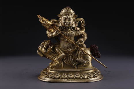 A GILT BRONZE VAISRAVANA BUDDHA STATUE.: Gilt Bronze Vaisravana Buddha Statue.