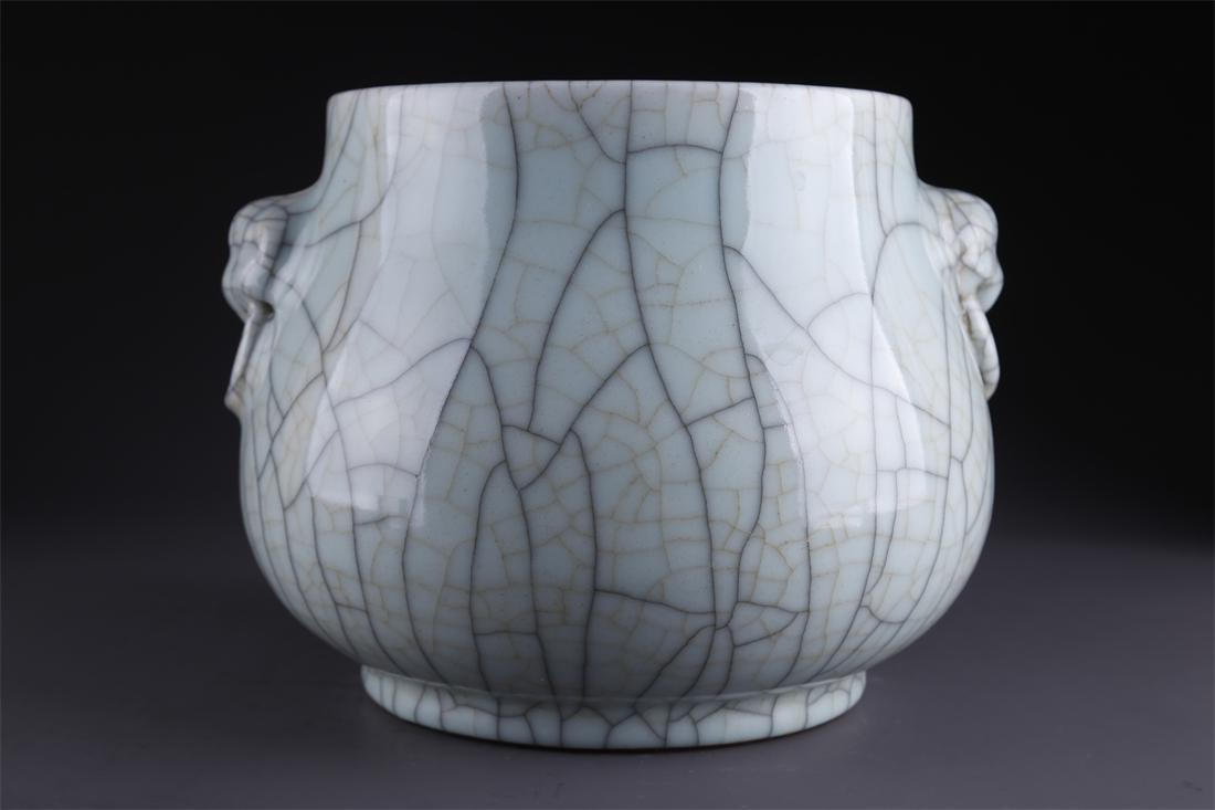 A PORCELAIN CENSER WITH BEAST FACE DESIGN. (1 of 9)