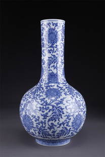 A BLUE-AND-WHITE LONG-NECK PORCELAIN BOTTLE.: Blue-and-White Long-Neck Porcelain Bottle with Passionflower and Eight Auspicious Symbols Design.