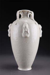 A PORCELAIN BOTTLE WITH FOUR RINGLIKE KNOBS.: Porcelain Bottle with Four Ringlike Knobs, Ding Kiln.