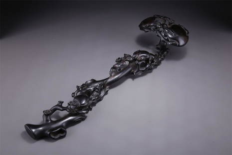 A NARRA WOOD RUYI CARVING WITH PEACH DESIGN.: Narra Wood Ruyi Carving Ornament with Longevous Peach Design.