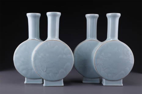 A SET OF CELESTE GLAZED CONJOINED BOTTLES.: A Set of Celeste Glazed Conjoined Porcelain Bottles, with Landscape Design.