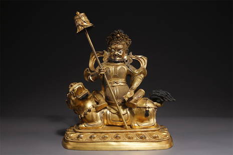 A TIBETAN GILT BRONZE VAISRAVANA BUDDHA STATUE.: Tibetan Gilt Bronze Vaisravana Buddha Statue.