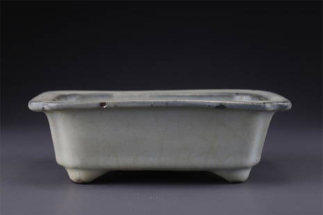 A CHAMFER-EDGED SQUARE PORCELAIN FLOWERPOT.: Chamfer-Edged Square Porcelain Flowerpot, Ru Kiln.