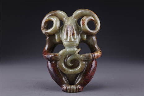 AN ANTIQUE JADE TOTEM CARVING ORNAMENT.: Antique Jade Totem Carving Ornament.