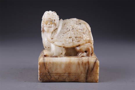 AN ANTIQUE JADE SEAL WITH TURTLE-SHAPED KNOB.: Antique Jade Seal with Dragon-Turtle-Shaped Knob.