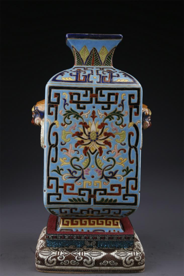 AN ENAMELED SQUARE PORCELAIN BOTTLE. (1 of 9)