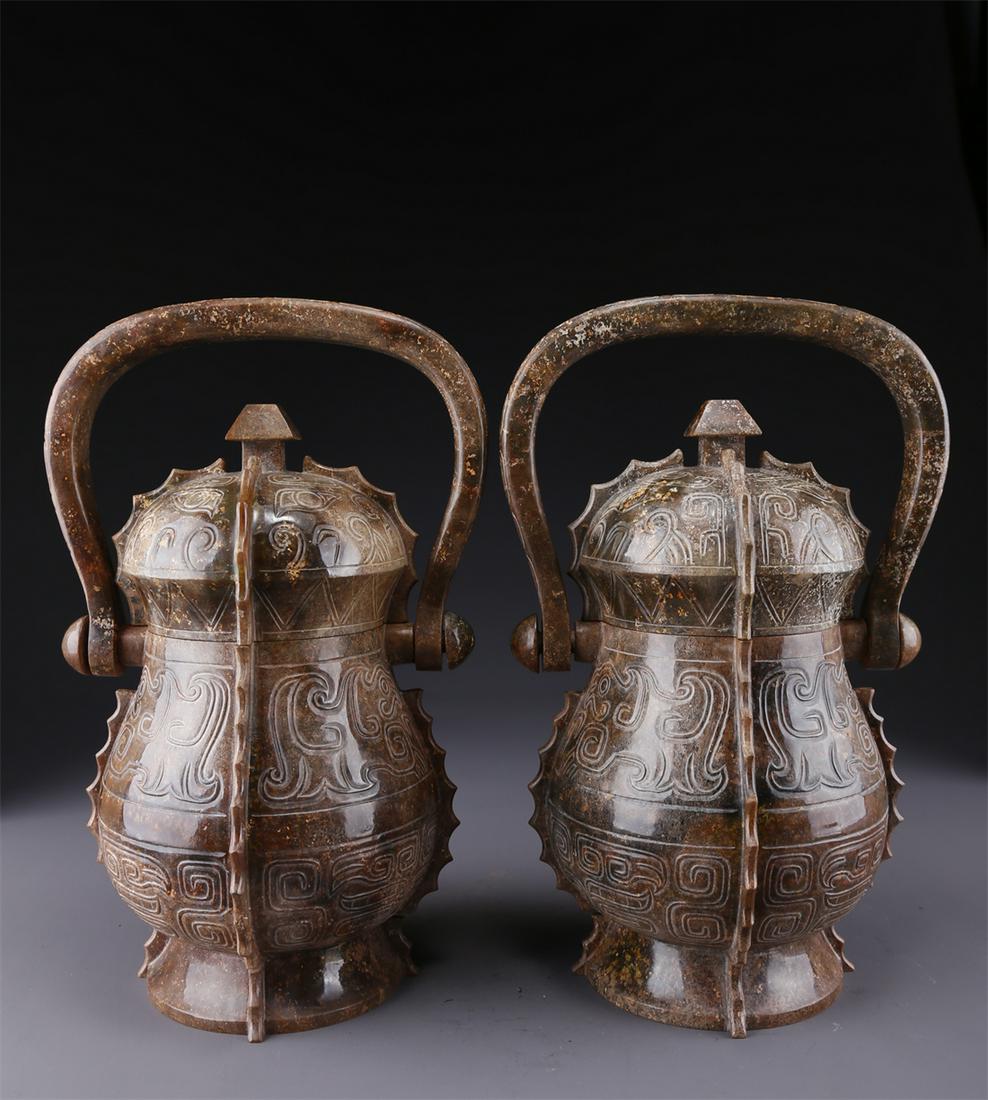 A SET OF ANTIQUE JADE WINE VESSELS "YOU".: A Set of Antique Jade Wine Vessels "You", with Loop Handle.