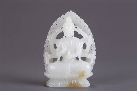 A HETIAN JADE EIGHT-ARM AVALOKITESVARA STATUE.: Hetian Jade Eight-Arm Avalokitesvara Statue.