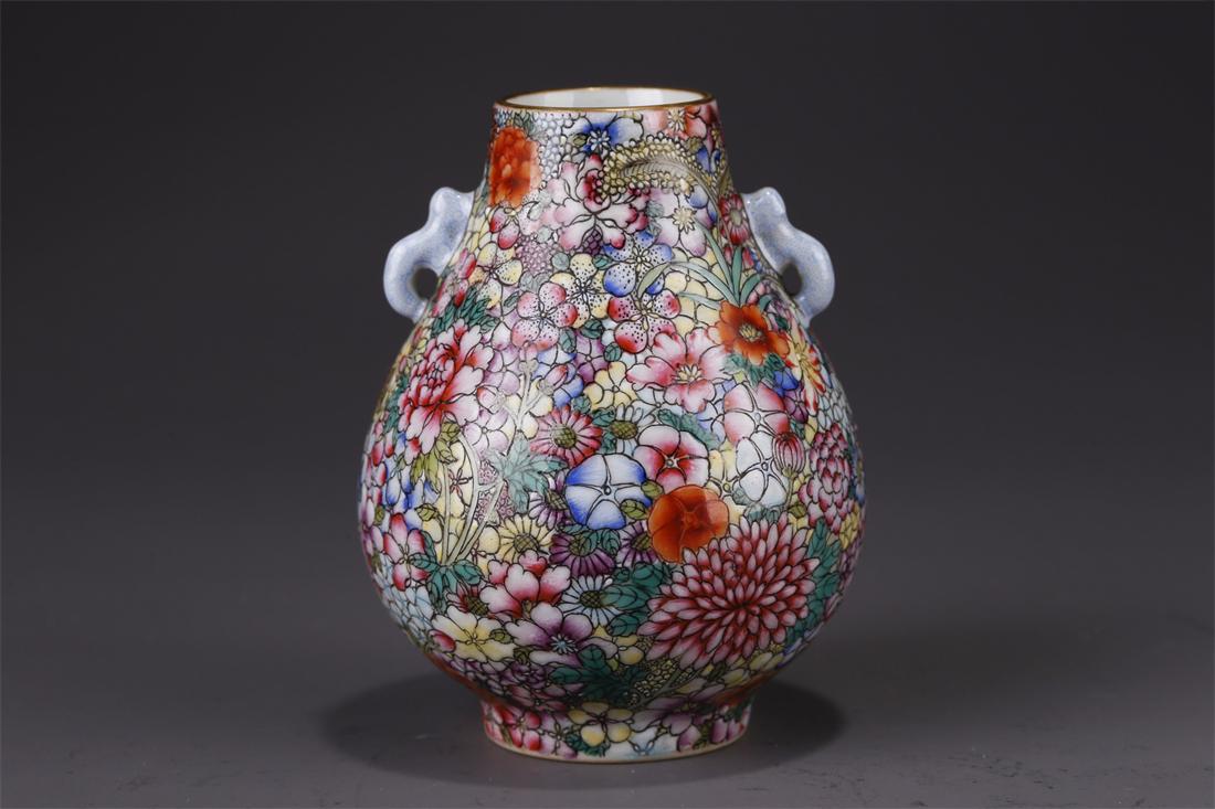 A FAMILLE ROSE PORCELAIN TWO-EAR BOTTLE. (1 of 9)