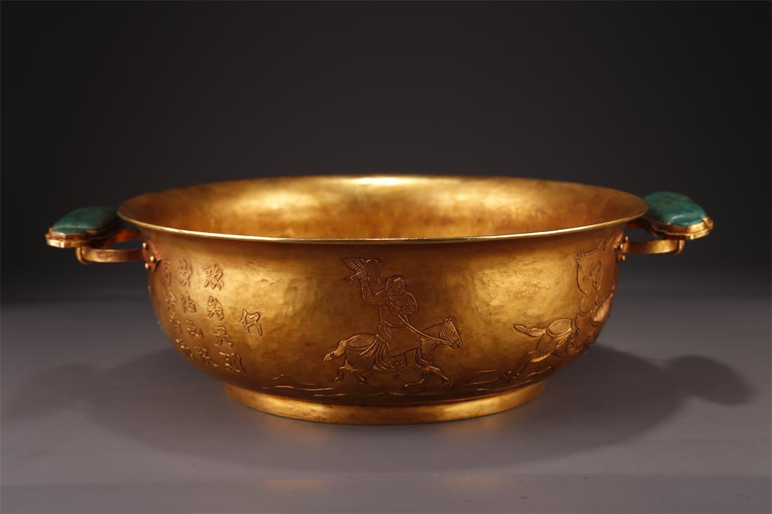 A GILT BRONZE BASIN WITH HUNTING MOTIF. (1 of 10)