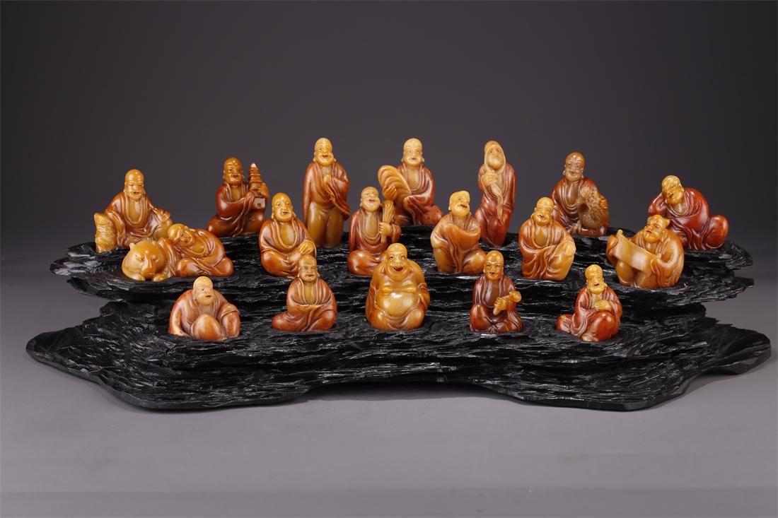 A SET OF SHOUSHAN STONE EIGHTEEN-ARHAT STATUES. (1 of 9)