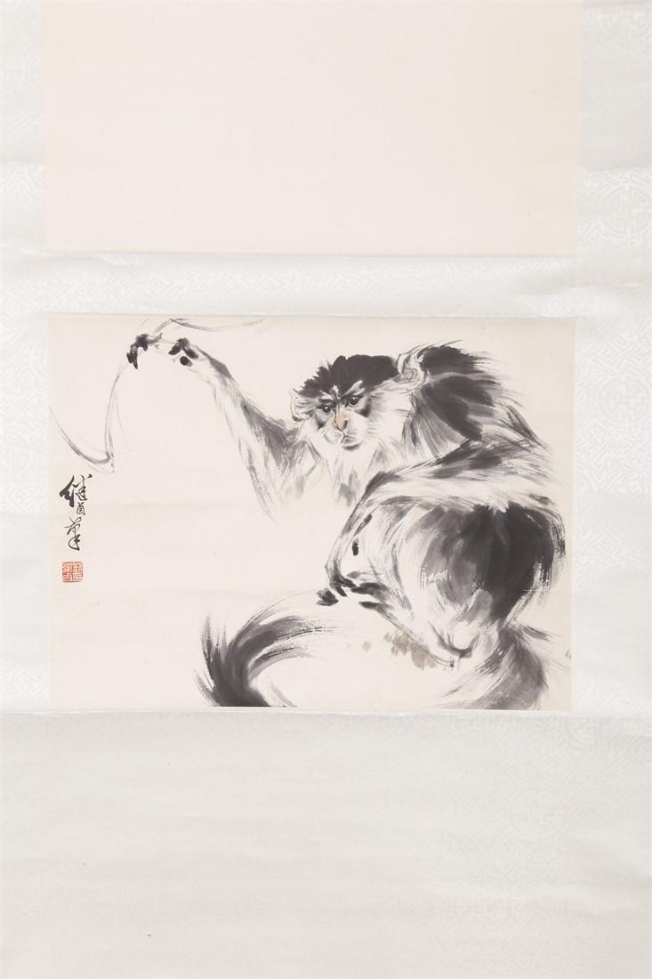 A MONKEY PAINTING ON PAPER BY LIU JIYOU. (1 of 8)