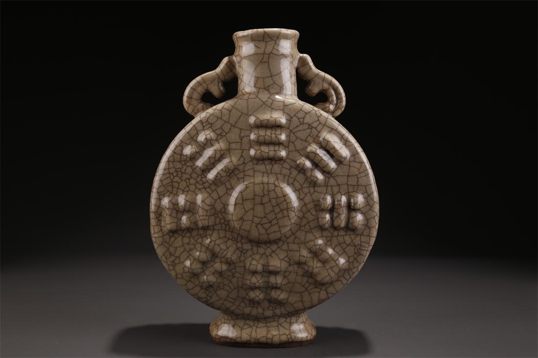 A TWO-EAR FLAT PORCELAIN BOTTLE, GE KILN. (1 of 9)