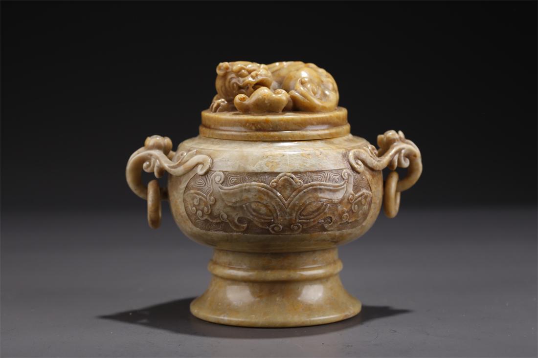 A SHOUSHAN STONE BEAST-KNOB INCENSE BURNER. (1 of 9)