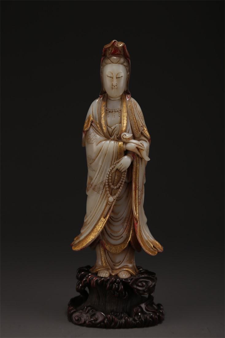 A SHOUSHAN STONE AVALOKITESVARA STATUE. (1 of 10)