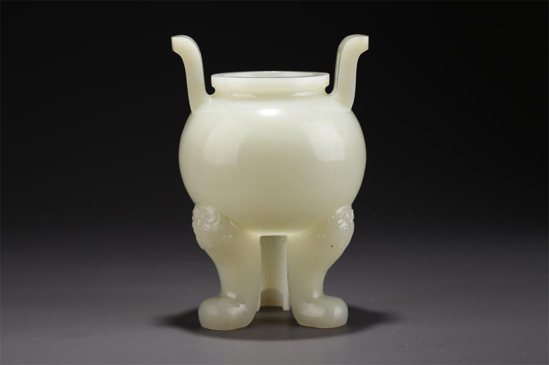 A HETIAN JADE TRIPOD CENSER. (1 of 9)