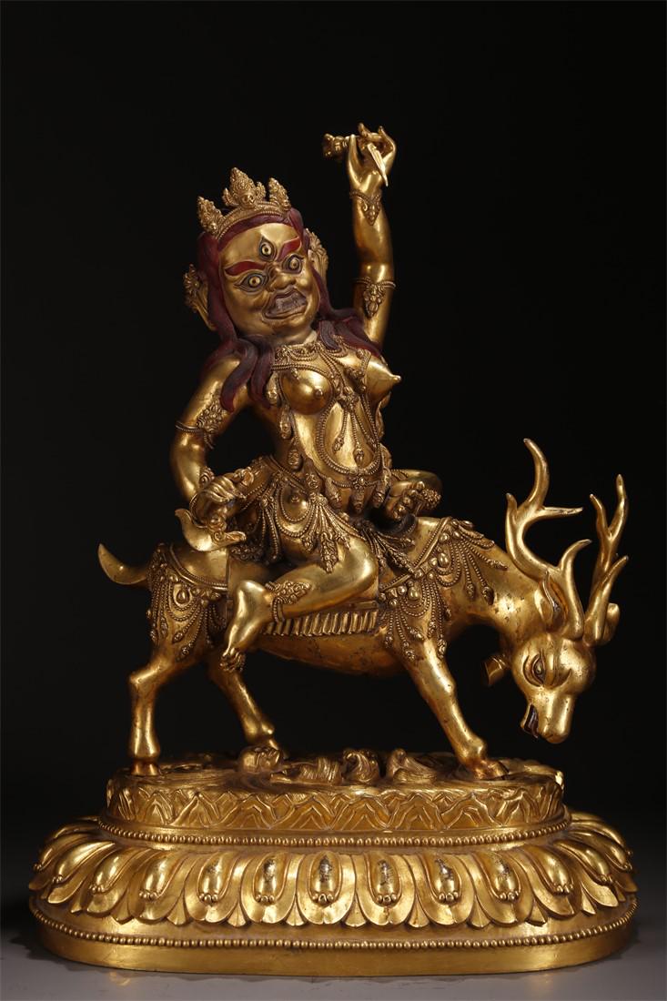 A GILT BRONZE DHARMAPALAS BUDDHA STATUE. (1 of 10)