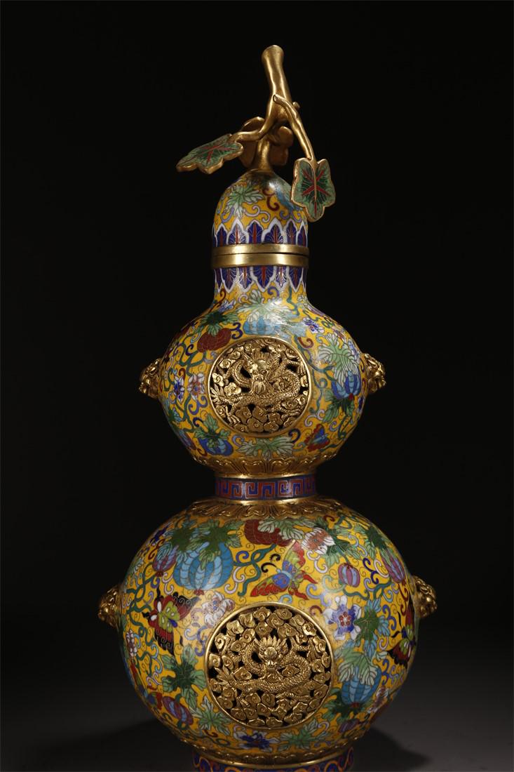 A CLOISONNE ENAMELED BRONZE BOTTLE. (1 of 10)