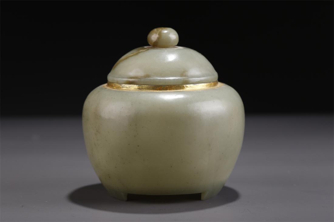 A HETIAN JADE LIDDED JAR. (1 of 9)