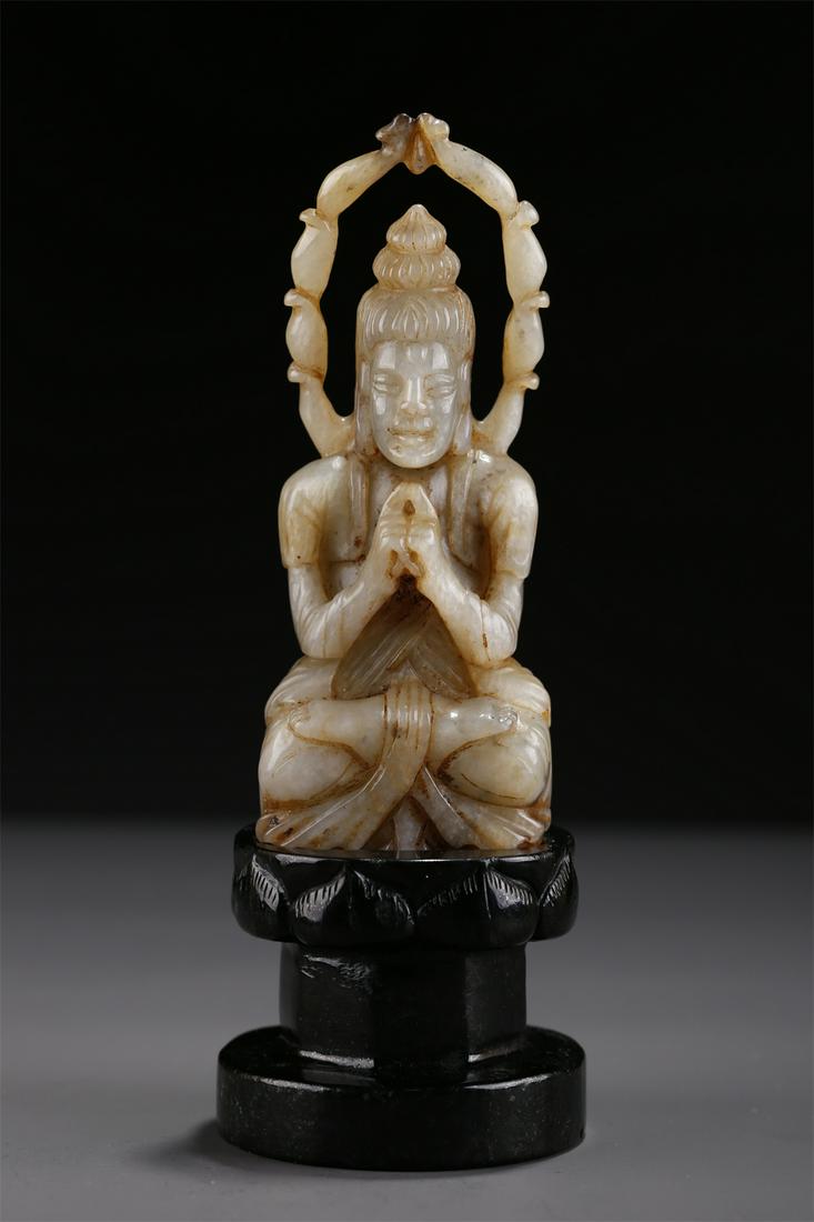 A HETIAN JADE BUDDHA STATUE, JASPER PEDESTAL. (1 of 9)