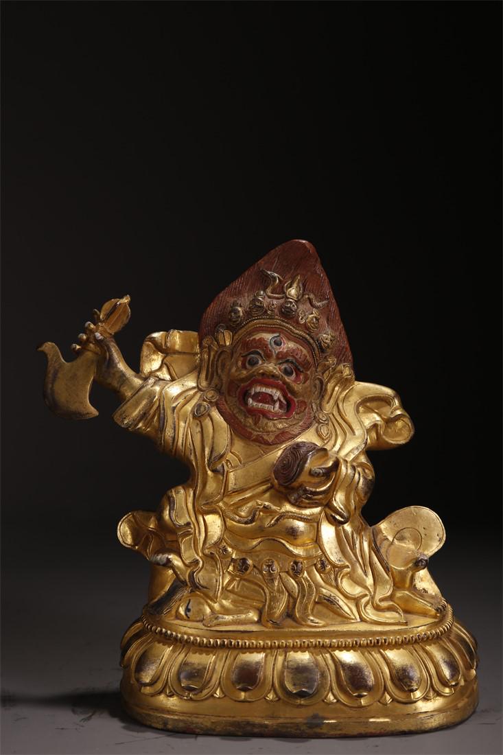 A TIBETAN GILT BRONZE MAHAKALA BUDDHA STATUE. (1 of 6)