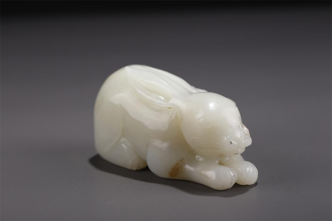 A HETIAN JADE RABBIT CARVING ORNAMENT. (1 of 9)