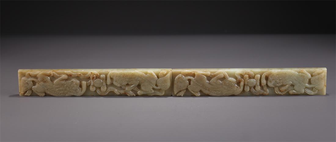 A SET OF HETIAN JADE PAPERWEIGHTS.: A Set of Hetian Jade Paperweights, with Carved Beast Design.