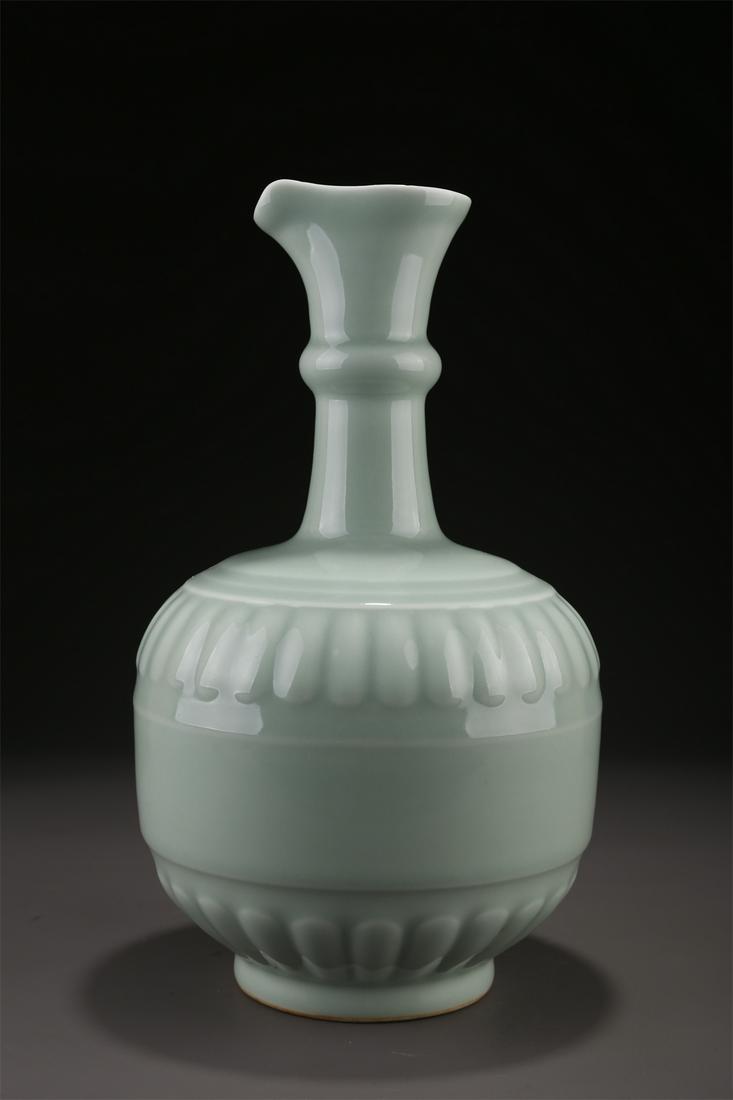 A PEA GREEN GLAZED PORCELAIN POT. (1 of 9)