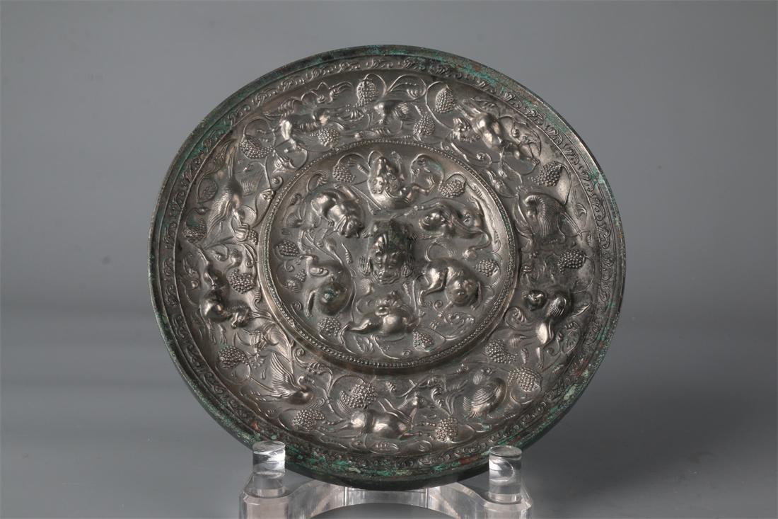 A BRONZE MIRROR WITH GRAPES AND BEAST DESIGN. (1 of 9)