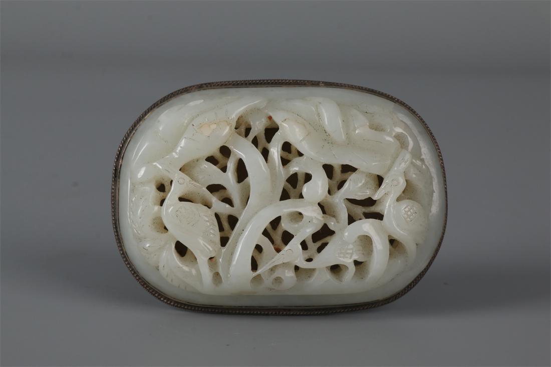 A HETIAN JADE BUTTON WITH SILVER INLAY. (1 of 9)