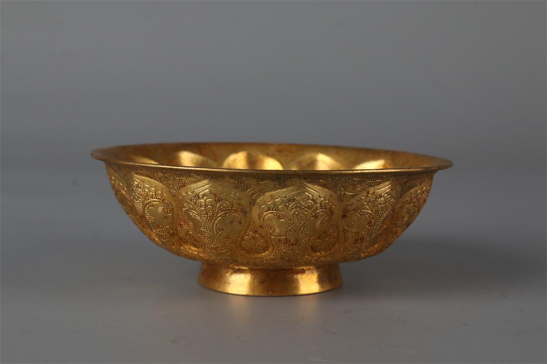 A GILT BRONZE BOWL WITH BRANCHES DESIGN. (1 of 9)