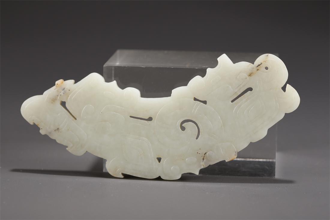 A HETIAN JADE ADORNMENT "HUANG". (1 of 9)
