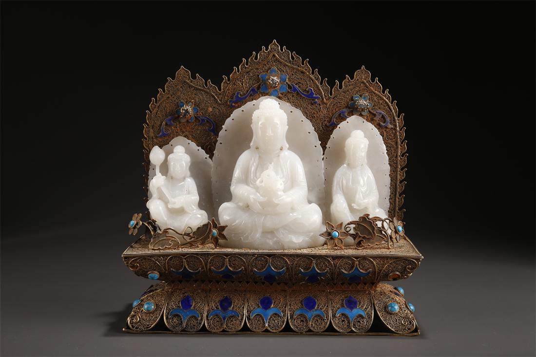 A HETIAN JADE BUDDHA STATUE WITH PEDESTAL. (1 of 9)