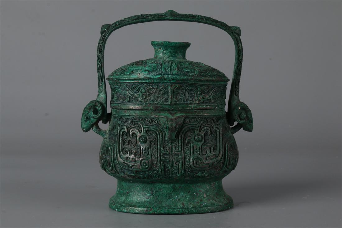 A BRONZE POT "YOU" WITH CARVED PHOENIX DESIGN. (1 of 9)
