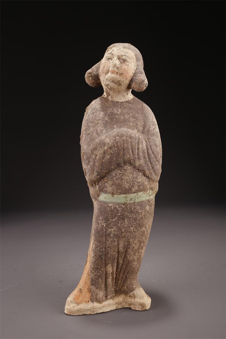 A POTTERY MAID SCULPTURE ORNAMENT. (1 of 9)