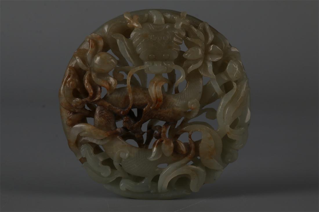 A HETIAN JADE OPENWORK CARVING PLATE. (1 of 8)