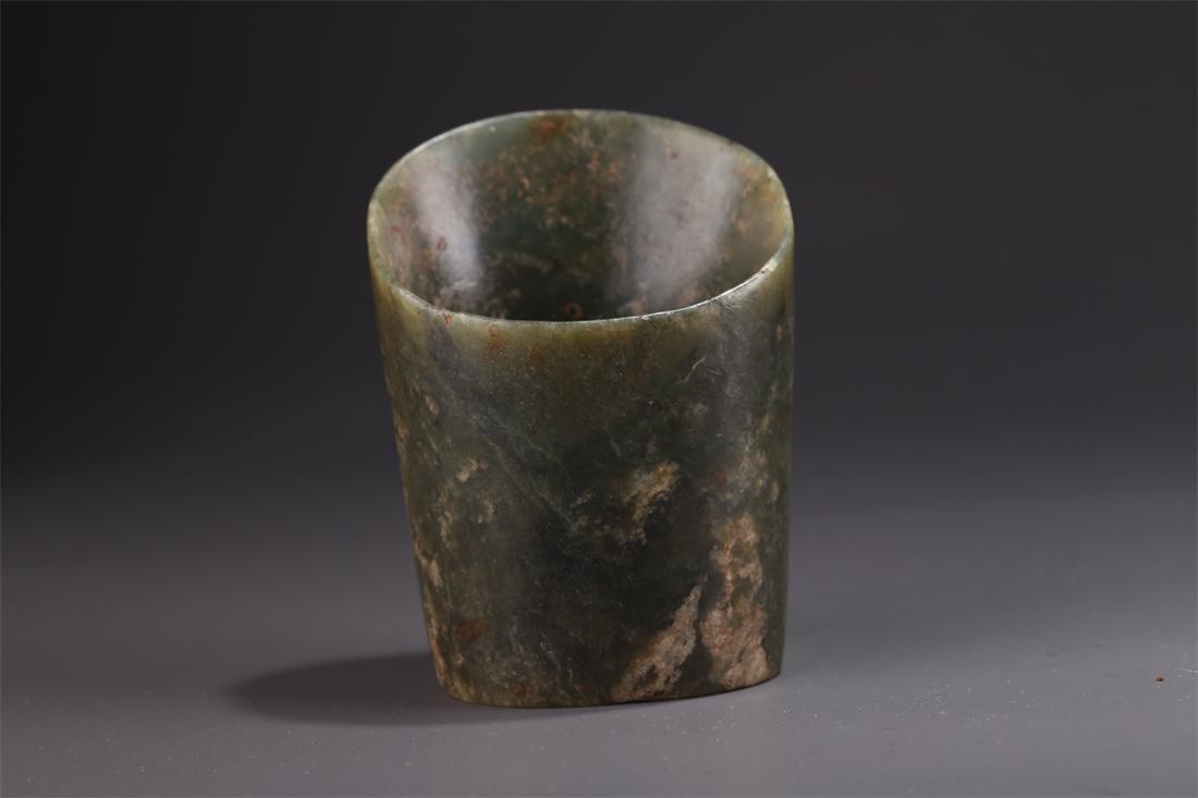A HONGSHAN JADE CYLINDRIC VESSEL. (1 of 9)