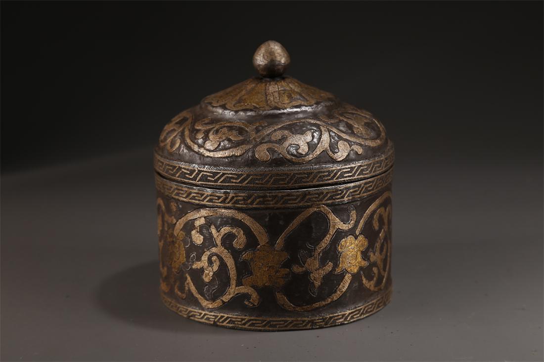 A CAST IRON LIDDED BOX WITH GOLD INLAY. (1 of 9)