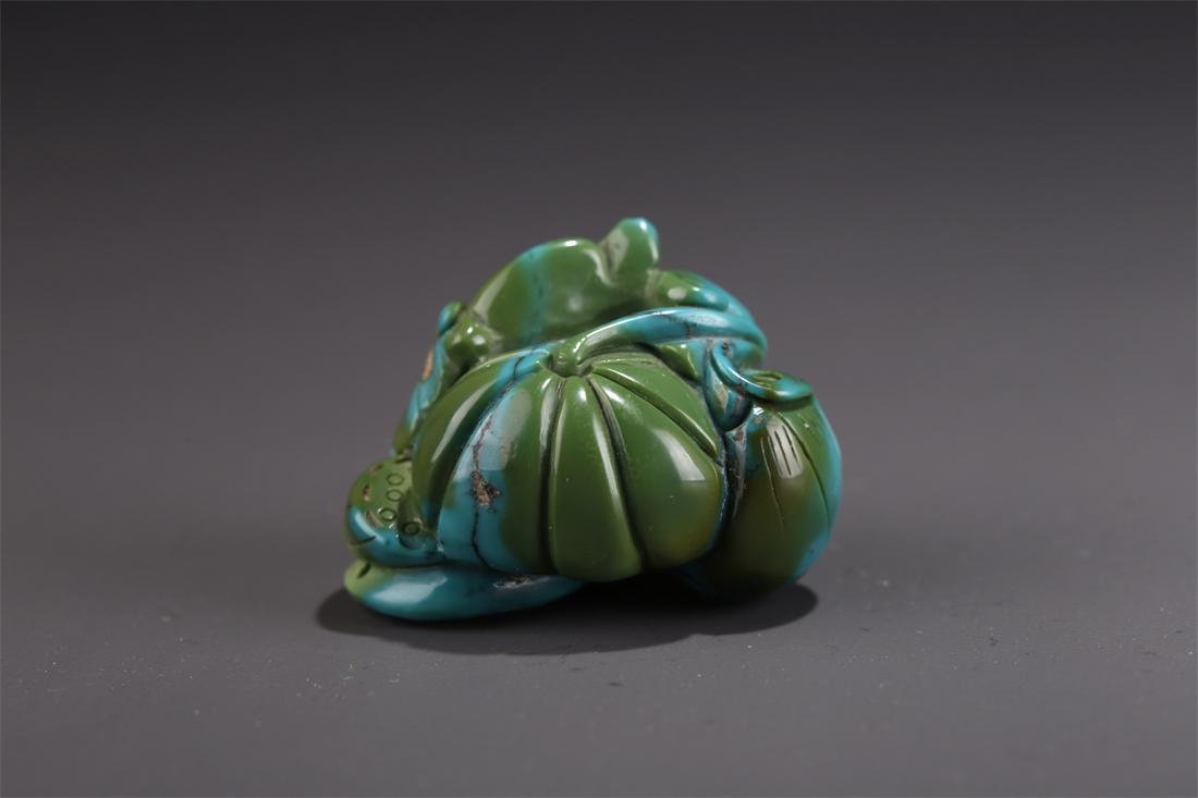 A TURQUOISE PENDANT WITH CARVED DRAGON DESIGN. (1 of 5)