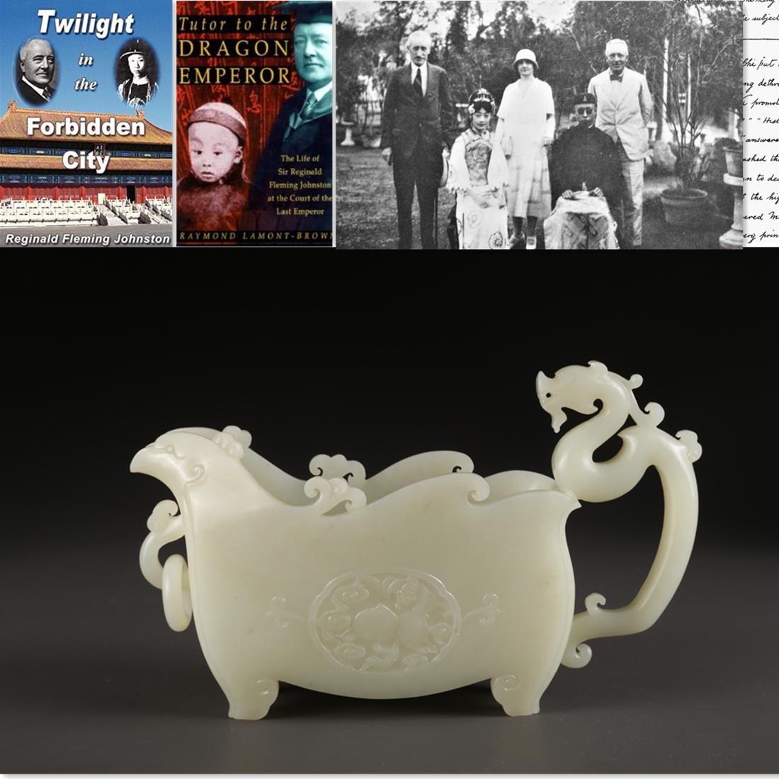 A JADE VESSEL "YI" WITH DRAGON-SHAPED HANDLE. (1 of 10)