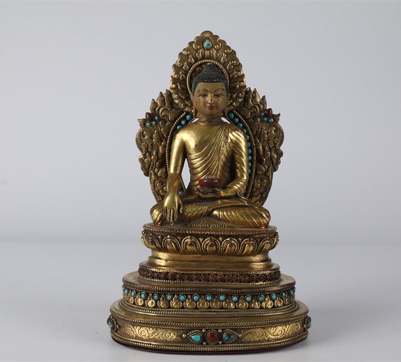 A TIBETAN GILT COPPER SAKYAMUNI BUDDHA STATUE. (1 of 7)