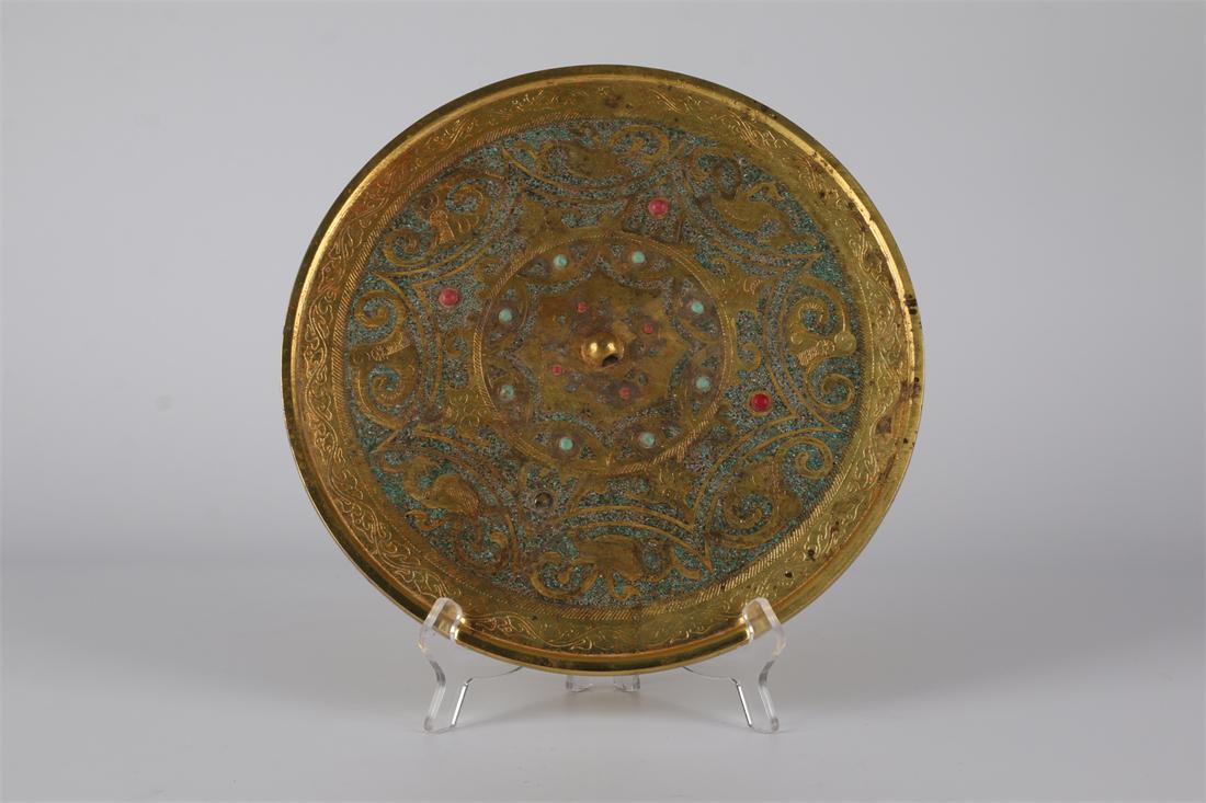 A COPPER MIRROR WITH GOLD INLAY. (1 of 6)