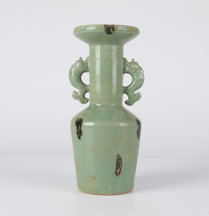 A GREEN PORCELAIN MALLET-SHAPED BOTTLE. (1 of 7)